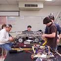 Mr. C & students working on the drive train